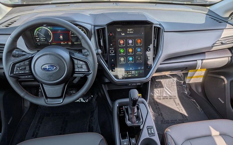 2026 Crosstrek Limited Hybrid interior — dash, 11.6-inch screen, and hybrid controls